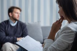 Therapist Talking to Client