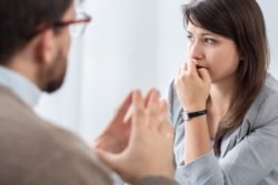 Woman with Anxiety Talking with Therapist