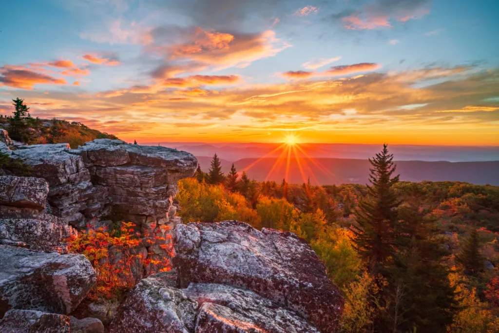 As viewed from the Bear Rocks area of the Dolly Sods Wilderness, the sun rises over a mountain ridge in the highlands of West Virginia.