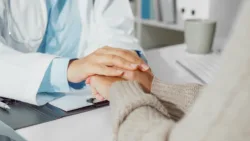 Close up of Young Asian woman doctors talking with the patient about mental health, for recover wellbeing and be a healthy lifestyle in health clinic. Medical health care concept.