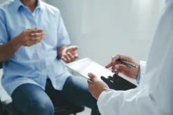 Doctor talking to patients are explaining the treatment of a patient's illness . Health and Medicine concept"