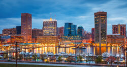 View on Baltimore skyline and Inner Harbor from Federal Hill at dusk, Maryland