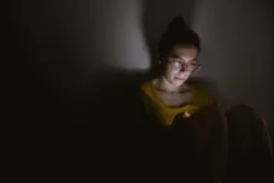 young-woman-addicted-to-technology-fear-of-missing-out-concept-fomo-stockpack-gettyimages Young woman addicted to technology. Fear of missing out concept - FOMO.