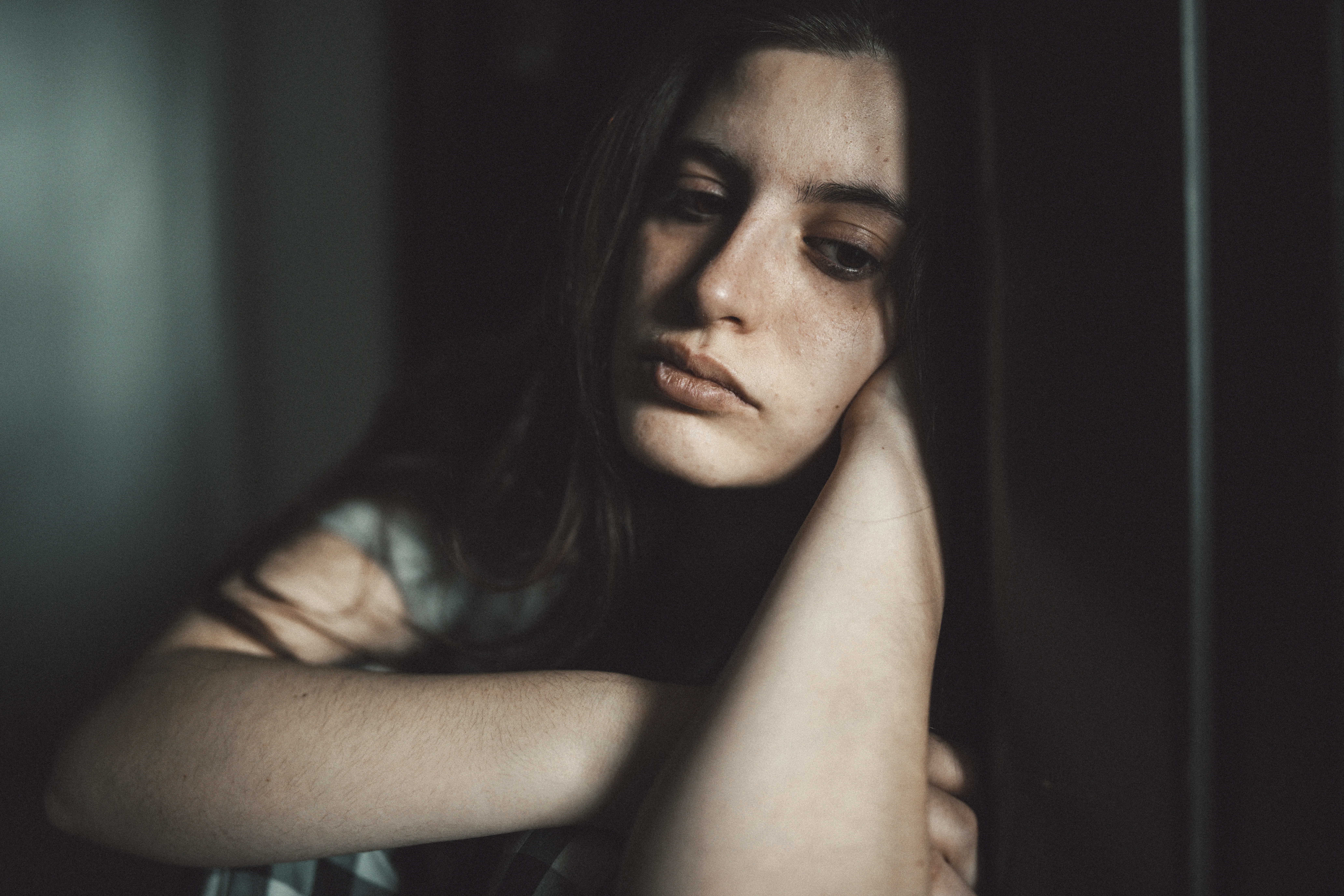 Young women struggling with depression and loneliness.